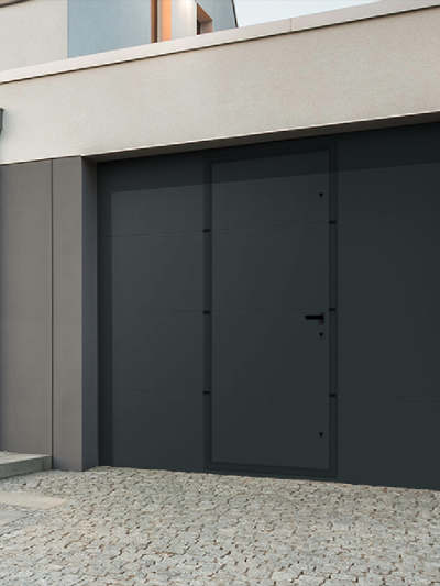 Porte de garage sectionnelle lisse Confort Portillon Intégré - MIA